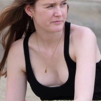 Candid babe with small boobs showing her cleavage while enjoying a beer beer2.jpg