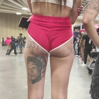 Couple of sexy candid car show girls in red booty shorts showing cheeks juicy.mp4-2025-08-28-07h23m14s196.jpg