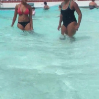 Black bikini babe with nice tits