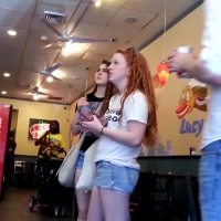 Ginger and brunette in shorts