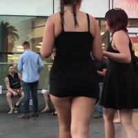 Cheeky babe in black skirt