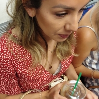 Pretty candid girl sitting on the train giving a peek of some cleavage and her bra Ug1.mp4-2022-09-18-07h52m48s059.jpg