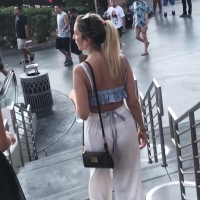 Blonde in see through white pants