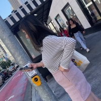 Asian in pink skirt