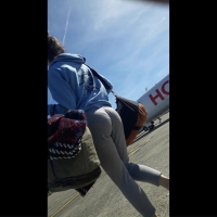 Brunette booty at the airport