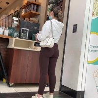 Sexy Latina in brown leggings