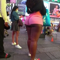 Ebony ass cheeks in pink shorts