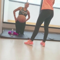 Pregnant Latina working out