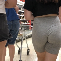 Cute brunette shopping with a nice ass in tight grey shorts with a wedgie Cute brunette with wedgie in tight shorts