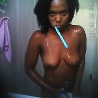 Sexy black girl in the bathroom
