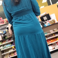Latina in a blue dress