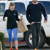 Miley Cyrus out in blue leggings with Liam Hemsworth Miley Cyrus blue leggings