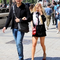candidsexystreet_36992197156_Eastern beauty in miniskirt and her boyfriend.jpg