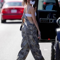 Madison Beer out in overalls and tiny white crop top showing her sexy cleavage Madison-Beer---In-camouflage-overalls-lunch-outing-in-West-Hollywood-08.jpg