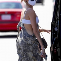 Madison Beer out in overalls and tiny white crop top showing her sexy cleavage Madison-Beer---In-camouflage-overalls-lunch-outing-in-West-Hollywood-18.jpg