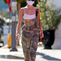 Madison Beer out in overalls and tiny white crop top showing her sexy cleavage Madison-Beer---In-camouflage-overalls-lunch-outing-in-West-Hollywood-22.jpg