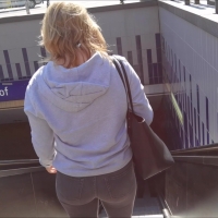 Sexy blonde in grey jeans