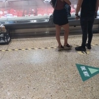 Brunette with nice legs in black shorts Brunette in shorts