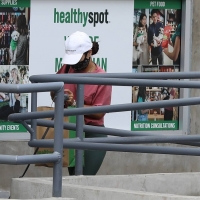 Vanessa Hudgens out with her dog in Hollywood in green spandex shorts 03.jpg
