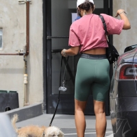 Vanessa Hudgens out with her dog in Hollywood in green spandex shorts 09.jpg