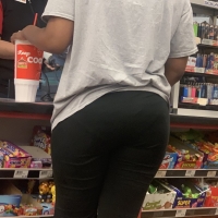 Candid black babe with a nice ass and vpl in flared leggings 65457373.jpg