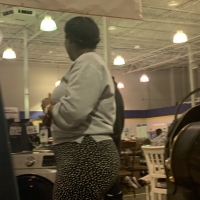 Candid big booty ebony milf shopping in black and white patterned leggings 65695631.jpg