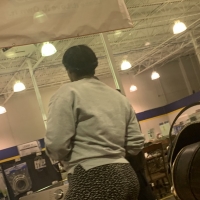 Candid big booty ebony milf shopping in black and white patterned leggings 65695632.jpg