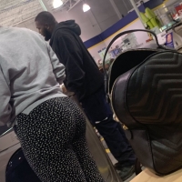 Candid big booty ebony milf shopping in black and white patterned leggings 65695636.jpg