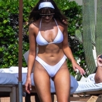 Olivia Culpo showing off her sexy body in a white bikini poolside in Cabo San Lucas 07.jpg