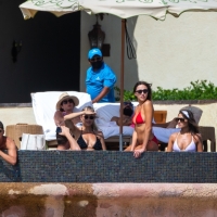 Olivia Culpo showing off her sexy body in a white bikini poolside in Cabo San Lucas 11.jpg