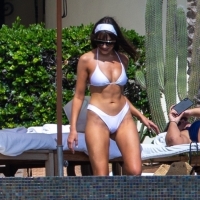 Olivia Culpo showing off her sexy body in a white bikini poolside in Cabo San Lucas 16.jpg