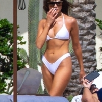 Olivia Culpo showing off her sexy body in a white bikini poolside in Cabo San Lucas 18.jpg