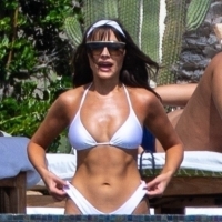 Olivia Culpo showing off her sexy body in a white bikini poolside in Cabo San Lucas 20.jpg
