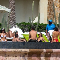 Olivia Culpo showing off her sexy body in a white bikini poolside in Cabo San Lucas 32.jpg