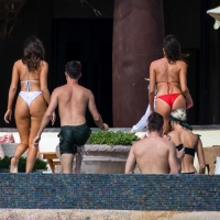 Olivia Culpo showing off her sexy body in a white bikini poolside in Cabo San Lucas 40.jpg