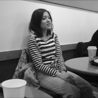 Candid beautiful Asian faces candidsexystreet_2096861755_Cafe Life; Lady Sitting at Old Round Wooden Table.jpg