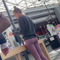 Blonde college girl at an Apple store