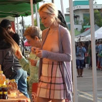 Beautiful braless blonde at the market