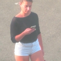 Candid hottie in the parking lot in white denim shorts 68272350.jpg