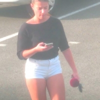 Candid hottie in the parking lot in white denim shorts 68272347.jpg