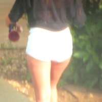 Candid hottie in the parking lot in white denim shorts 68272362.jpg