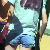 Skinny candid brunette in little denim shorts with nice legs 68268419.jpg