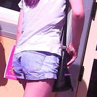 Skinny candid brunette in little denim shorts with nice legs 68268423.jpg