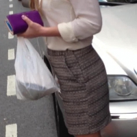 Sexy girl in the streets in grey skirt Sexy girl in skirt on the street