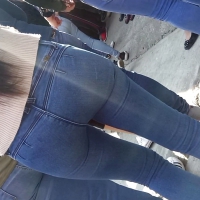 Petite brunette with a nice ass in tight jeans Petite tight ass in jeans