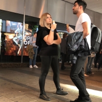 Ice cream eater in leather leggings
