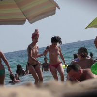 Two hot ass topless beach babes with cornrows showing their awesome tits nice-hairdos-123.jpg