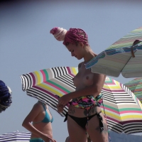 Two hot ass topless beach babes with cornrows showing their awesome tits nice-hairdos-126.jpg