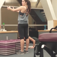 Cute brunette working out