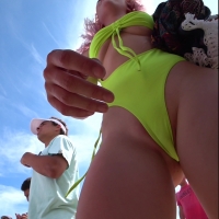 Beach babe showing her pussy lips